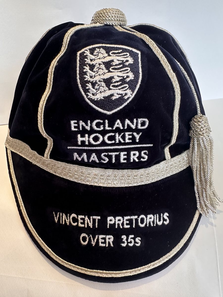 England Hockey Masters honours cap, front view, with a name and OVER 35s embroidered on the peak